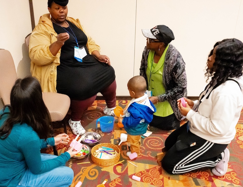 Quality Improvement - Boy Playing with Caregiver